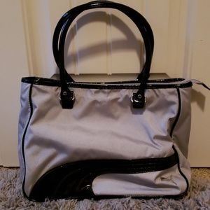 Gray and black Puma bag